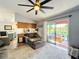 Living area with view of backyard and pool at 615 Osage Ct, Winter Springs, FL 32708