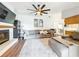 Comfortable living room with fireplace and built-in shelving at 615 Osage Ct, Winter Springs, FL 32708