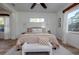 Main bedroom with a neutral color palette and plenty of natural light at 720 Napoli Ln, New Smyrna Beach, FL 32168