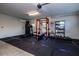 Home gym with various equipment including a treadmill and weight rack at 720 Napoli Ln, New Smyrna Beach, FL 32168