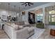 Open floor plan with spacious living area and kitchen at 720 Napoli Ln, New Smyrna Beach, FL 32168