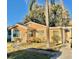 Tan single story house with a walkway and palm tree at 770 Carver St, Winter Park, FL 32789