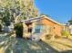 Tan single-story house with a yard at 770 Carver St, Winter Park, FL 32789