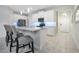 Modern kitchen with white cabinets, stainless steel appliances, and an island at 11006 Silver Surfer Aly, Winter Garden, FL 34787