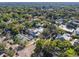 Wide aerial view showing the home's neighborhood context and surrounding landscape at 123 N Hyer Ave, Orlando, FL 32801