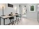 Small kitchen breakfast bar with marble top and black metal stools at 123 N Hyer Ave, Orlando, FL 32801