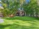 Backyard pergola with seating area and bamboo privacy at 123 N Hyer Ave, Orlando, FL 32801