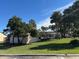 Inviting community pool area with lush landscaping and palm trees at 138 Meadow Blvd, Sanford, FL 32771