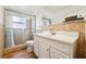 Clean bathroom featuring a shower/tub combo and white vanity at 1413 Evangeline Ave, Orlando, FL 32809