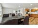 Bright dining area features a dark wood table with six chairs, adjacent to kitchen at 1413 Evangeline Ave, Orlando, FL 32809