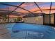 Rectangle pool with screened enclosure at 1413 Evangeline Ave, Orlando, FL 32809