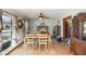 Bright dining room with wood floors and large windows at 1432 Libby Rd, Babson Park, FL 33827