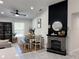 Dining area with farmhouse table and fireplace at 1490 11Th Ave, Deland, FL 32724