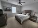 Cozy bedroom with neutral decor and ample natural light at 15783 Tangerine Dream Ct, Winter Garden, FL 34787