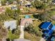 Bird's-eye view of a house with a circular pool in the backyard at 1715 Concert Rd, Deltona, FL 32738