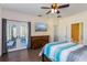 Main bedroom with private access to patio and walk-in closet at 1715 Concert Rd, Deltona, FL 32738