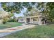 Ranch home exterior with covered porch and walkway at 1819 Paloma Ave, Sanford, FL 32771