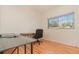 Home office featuring a standing desk and hardwood floors at 1819 Paloma Ave, Sanford, FL 32771