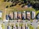 Aerial view of a house with a pool in a residential neighborhood at 1861 Goblet Cove St, Kissimmee, FL 34746