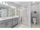 Modern bathroom with double vanity, large shower, and separate toilet area at 1861 Goblet Cove St, Kissimmee, FL 34746