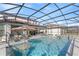 Stunning pool with a swim-up bar and screened enclosure at 1861 Goblet Cove St, Kissimmee, FL 34746