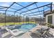 Luxury pool and spa with a screened enclosure at 1861 Goblet Cove St, Kissimmee, FL 34746