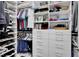 Large walk-in closet with shelving and drawers at 1954 Filly Trl, Oviedo, FL 32765