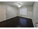 Spacious bedroom with dark hardwood floors and ceiling fan at 1979 Summer Club Dr # 309, Oviedo, FL 32765