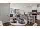 Casual dining area with round table and chairs, adjacent to kitchen at 2215 Tongass Bnd, Davenport, FL 33896