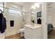 Modern bathroom with a glass shower and updated fixtures at 237 Hazeltine Dr, Debary, FL 32713