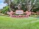 DeBary Golf & Country Club entrance sign with landscaping at 237 Hazeltine Dr, Debary, FL 32713