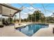 Relaxing pool and screened-in patio area at 237 Hazeltine Dr, Debary, FL 32713