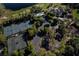 Aerial view of community tennis courts and parking at 237 Hazeltine Dr, Debary, FL 32713