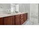 Bathroom featuring a double sink vanity with a walk-in shower and bathtub at 2555 Sand Arbor Cir, Orlando, FL 32824