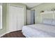 Bright bedroom with double doors and wood floors at 257 Bonville Dr, Davenport, FL 33897