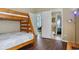 Bedroom with bunk beds, and access to a bathroom at 257 Bonville Dr, Davenport, FL 33897