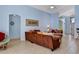 Living room with brown sofa and comfortable seating at 257 Bonville Dr, Davenport, FL 33897