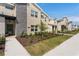 Townhome community featuring multiple units and manicured lawns at 2600 Reading Trl, Kissimmee, FL 34746