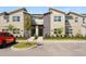 Two story townhome with modern facade and landscaping at 2600 Reading Trl, Kissimmee, FL 34746