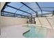 Private screened pool and spa with plenty of space for relaxation at 2600 Reading Trl, Kissimmee, FL 34746