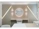 Stylish vanity area with a large mirror and modern lighting at 2600 Reading Trl, Kissimmee, FL 34746