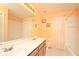 Bathroom with double vanity and tub at 2642 Maggiore Cir, Kissimmee, FL 34746