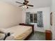 Bedroom with a double bed, ceiling fan, and window coverings at 3107 S Park Ave, Sanford, FL 32773