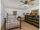 Bright bedroom with ceiling fan and neutral carpeting at 3107 S Park Ave, Sanford, FL 32773