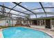 Refreshing screened pool with a large deck at 3107 S Park Ave, Sanford, FL 32773