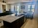 Kitchen with large island, granite countertops, and stainless steel appliances at 3333 Wauseon Dr, Saint Cloud, FL 34772