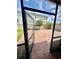 View of the backyard featuring brick pavers and a tree line at 3333 Wauseon Dr, St Cloud, FL 34772