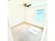 Neutral bedroom with carpet, fresh white walls, a window and a ceiling fan at 3333 Wauseon Dr, St Cloud, FL 34772