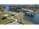 Aerial view of community boat lift amenity with picnic pavilions and lush landscaping at 3333 Wauseon Dr, St Cloud, FL 34772