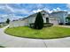 Well maintained home with green lawn, landscaping and a brick paver driveway leading to a two-car garage at 3333 Wauseon Dr, St Cloud, FL 34772